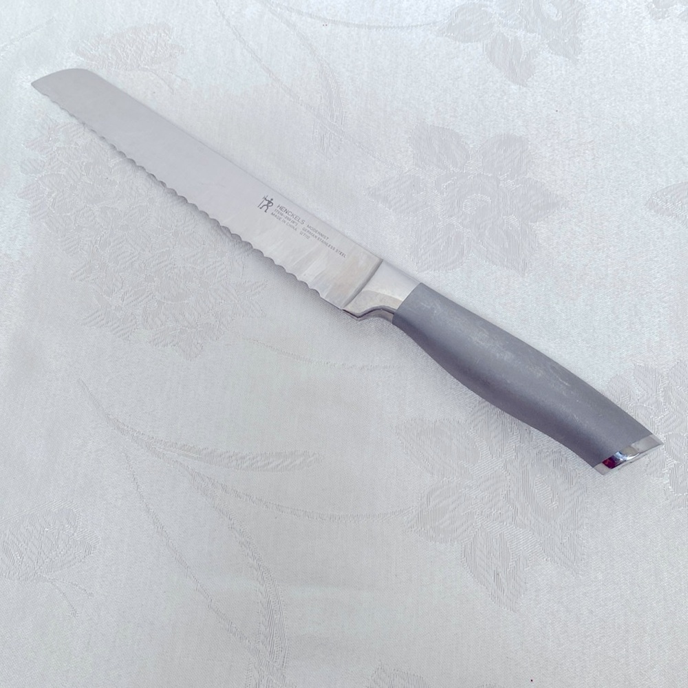 HENCKELS Modernist Stainless Steel 8 Inch bread knife. Great preowned condition